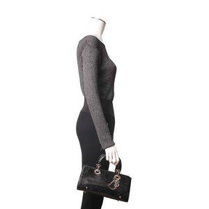 https://dbiyorq10n2b9.cloudfront.net/product-images/CBAGCD0082/CHRISTIAN-DIOR-Patent-Cannage-East-West-Lady-Dior-Top-Handle-Bag-Black.jpg.webp