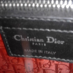 https://dbiyorq10n2b9.cloudfront.net/product-images/CBAGCD125/CHRISTIAN-DIOR-Lambskin-Mini-Lady-Dior-Bag-Black-close-up.jpg.webp