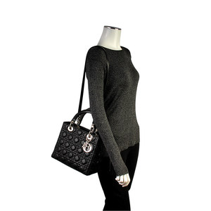 https://dbiyorq10n2b9.cloudfront.net/product-images/CBAGCD125/CHRISTIAN-DIOR-Lambskin-Mini-Lady-Dior-Bag-Black-mannequin.jpg.webp
