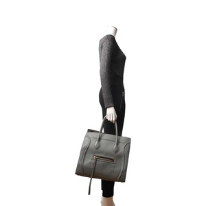 https://dbiyorq10n2b9.cloudfront.net/product-images/CBAGCEL0087/CELINE-Leather-Large-Phantom-Luggage-Tote-Grey-Green.jpg.webp