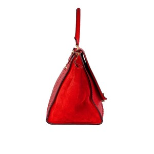 https://dbiyorq10n2b9.cloudfront.net/product-images/CBAGCEL101/CELINE-Medium-Trapeze-Python-bag-red-side1.jpg.webp