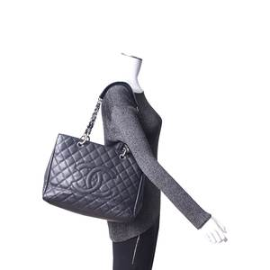 https://dbiyorq10n2b9.cloudfront.net/product-images/CBAGCH0114/CHANEL-Quilted-Caviar-Grand-Shopping-Tote-Black.jpg.webp