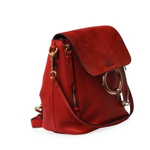 https://dbiyorq10n2b9.cloudfront.net/product-images/CBAGCHL0004/CHLOE-Leather-and-Suede-Small-Faye-Backpack-Sepia-Red-angle.jpg.webp