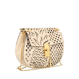 https://dbiyorq10n2b9.cloudfront.net/product-images/CBAGCHL0013/CHLOE-Leather-Drew-Laser-Cut-Crossbody-Bag-Ivory-3.jpg.webp