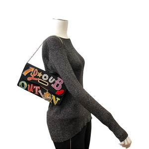 https://dbiyorq10n2b9.cloudfront.net/product-images/CBAGCL0003/CHRISTIAN-LOUBOUTIN-Canvas-Patch-Letters-Riviera-Clutch-Black-mannequin.jpg.webp
