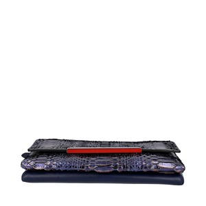 https://dbiyorq10n2b9.cloudfront.net/product-images/CBAGCL0050/CHRISTIAN-LOUBOUTIN-Python-Rougissime-Clutch-Bag-Metallic-Blue._5.jpg.webp
