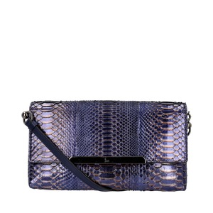 https://dbiyorq10n2b9.cloudfront.net/product-images/CBAGCL0050/CHRISTIAN-LOUBOUTIN-Python-Rougissime-Clutch-Bag-Metallic-Blue._6.jpg.webp
