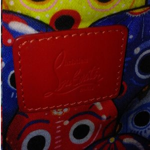 https://dbiyorq10n2b9.cloudfront.net/product-images/CBAGCL108/CHRISTIAN-LOUBOUTIN-Mexicaba-Tote-Multicolor-Limited-Edition-close-up.jpg.webp