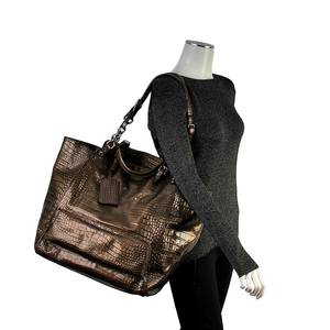 https://dbiyorq10n2b9.cloudfront.net/product-images/CBAGDG117/DOLCE-GABBANA-Croc-Embossed-Miss-Pocket-Travel-Bag-Metallic-Green-mannequin.jpg.webp
