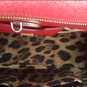 https://dbiyorq10n2b9.cloudfront.net/product-images/CBAGDG121/DOLCE-GABBANA-Leather-Large-Miss-Sicily-Bag-Red-interior.jpg.webp