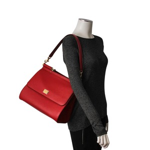 https://dbiyorq10n2b9.cloudfront.net/product-images/CBAGDG121/DOLCE-GABBANA-Leather-Large-Miss-Sicily-Bag-Red-mannequin.jpg.webp