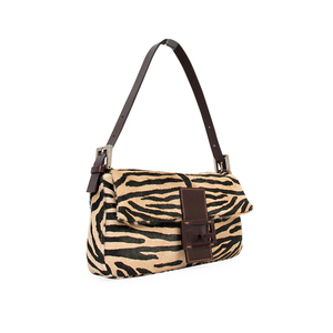 https://dbiyorq10n2b9.cloudfront.net/product-images/CBAGFEN0024/FENDI-Calf-Hair-Baguette-Zebra-Print-Angle.jpg.webp