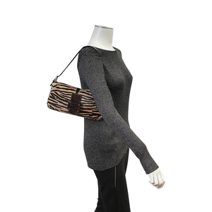 https://dbiyorq10n2b9.cloudfront.net/product-images/CBAGFEN0024/FENDI-Calf-Hair-Baguette-Zebra-Print-Mannequin.jpg.webp