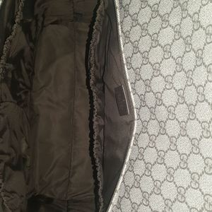 https://dbiyorq10n2b9.cloudfront.net/product-images/CBAGGUC0030/GUCCI-GG-Supreme-Plus-Diaper-Bag-interior.jpg.webp