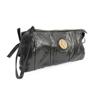 https://dbiyorq10n2b9.cloudfront.net/product-images/CBAGGUC0089/GUCCI-Python-Hysteria-Clutch-Black-angle.jpg.webp
