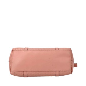 https://dbiyorq10n2b9.cloudfront.net/product-images/CBAGGUC0421/GUCCI-Microguccissima-Margaux-Tote-Pink-NEW-_6.jpg.webp