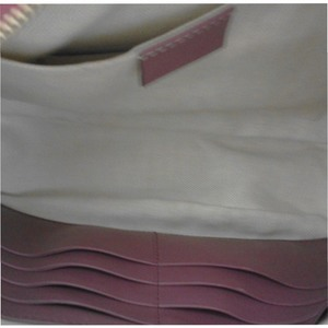 https://dbiyorq10n2b9.cloudfront.net/product-images/CBAGGUC315/GUCCI-Guccissima-Bree-Mini-Messenger-interior.jpg.webp