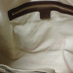 https://dbiyorq10n2b9.cloudfront.net/product-images/CBAGGUC347/GUCCI-Guccissima-Jackie-Medium-Hobo-Brown-interior.jpg.webp