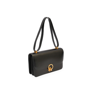 https://dbiyorq10n2b9.cloudfront.net/product-images/CBAGHER0005/HERMES-Vintage-Leather-Ring-Shoulder-Bag-Black-angle.jpg.webp
