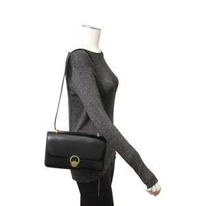 https://dbiyorq10n2b9.cloudfront.net/product-images/CBAGHER0005/HERMES-Vintage-Leather-Ring-Shoulder-Bag-Black-mannequin.jpg.webp