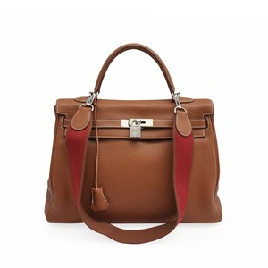 https://dbiyorq10n2b9.cloudfront.net/product-images/CBAGHER0009/HERMES-Taurillon-Clemence-Retourne-Kelly-35-Front-3.jpg.webp