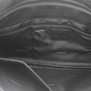 https://dbiyorq10n2b9.cloudfront.net/product-images/CBAGLAN102/LANVIN-Grained-Leather-Pouch-Black-interior.jpg.webp