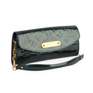 https://dbiyorq10n2b9.cloudfront.net/product-images/CBAGLV0008/LOUIS-VUITTON-Vernis-Sunset-Boulevard-Clutch-Green-angle.jpg.webp