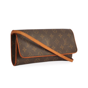 https://dbiyorq10n2b9.cloudfront.net/product-images/CBAGLV0061/LOUIS-VUITTON-Vintage-Monogram-Twin-Pochette-GM-angle.jpg.webp