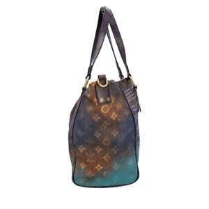 https://dbiyorq10n2b9.cloudfront.net/product-images/CBAGLV1335/LOUIS-VUITTON-X-RICHARD-PRINCE-Monogram-Snake-Skin-Karung-Heartbreak-Jokes-Tote-Limited-Edition_3.jpg.webp