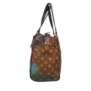 https://dbiyorq10n2b9.cloudfront.net/product-images/CBAGLV1335/LOUIS-VUITTON-X-RICHARD-PRINCE-Monogram-Snake-Skin-Karung-Heartbreak-Jokes-Tote-Limited-Edition_4.jpg.webp