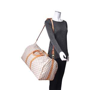 https://dbiyorq10n2b9.cloudfront.net/product-images/CBAGLV1566/LOUIS-VUITTON-Damier-Azur-Keepall-Bandouliere-55.jpg.webp