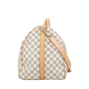 https://dbiyorq10n2b9.cloudfront.net/product-images/CBAGLV1566/LOUIS-VUITTON-Damier-Azur-Keepall-Bandouliere-55_3.jpg.webp