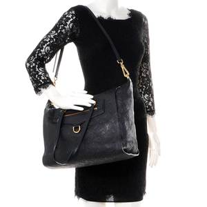 https://dbiyorq10n2b9.cloudfront.net/product-images/CBAGLV319/LOUIS-VUITTON-Monogram-Empreinte-Lumineuse-PM-Black_Noir-mannequin.jpg.webp