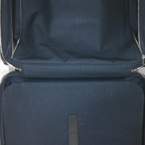 https://dbiyorq10n2b9.cloudfront.net/product-images/CBAGLV477/LOUIS-VUITTON-Taiga-Pilot-Case-Black-interior.jpg.webp