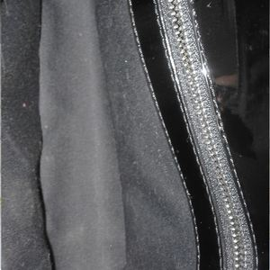 https://dbiyorq10n2b9.cloudfront.net/product-images/CBAGLV574/LOUIS-VUITTON-Electric-Epi-Pochette-SoBe-Clutch-Noir-interior.jpg.webp