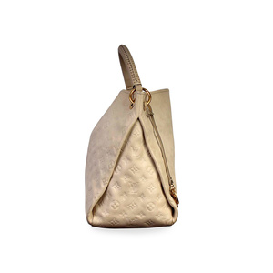 https://dbiyorq10n2b9.cloudfront.net/product-images/CBAGLV789/LOUIS-VUITTON-Empreinte-Artsy-MM-Neige-side-1.jpg.webp