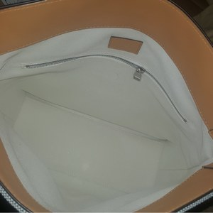 https://dbiyorq10n2b9.cloudfront.net/product-images/CBAGLV812/LOUIS-VUITTON-Calfskin-V-Hobo-PM-White-NEW-interior.jpg.webp