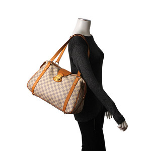 https://dbiyorq10n2b9.cloudfront.net/product-images/CBAGLV899/LOUIS-VUITTON-Damier-Azur-Stresa-PM-mannequin.jpg.webp