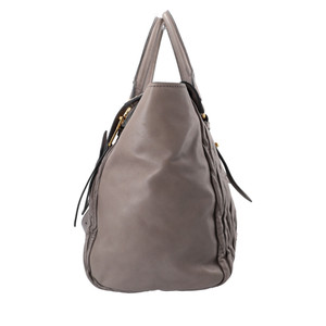 https://dbiyorq10n2b9.cloudfront.net/product-images/CBAGMIU0016/MIU-MIU-Matelasse-Shopper-Marble_3.jpg.webp