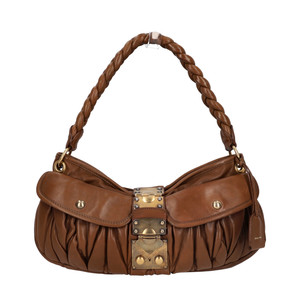 https://dbiyorq10n2b9.cloudfront.net/product-images/CBAGMIU0018/MIU-MIU-Leather-Matelasse-Coffer-Hobo-Brown_1.jpg.webp