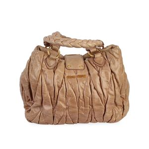 https://dbiyorq10n2b9.cloudfront.net/product-images/CBAGMIU108/MIU-MIU-Matelasse-Coffer-Two-Way-Bag-Beige-back.jpg.webp