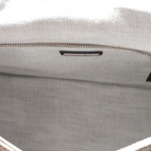 https://dbiyorq10n2b9.cloudfront.net/product-images/CBAGMIU109/MIU-MIU-Denim-Logo-Print-Shoulder-Bag-BlackWhite-interior.jpg.webp