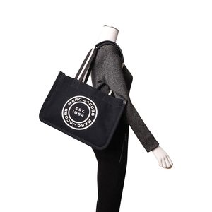 https://dbiyorq10n2b9.cloudfront.net/product-images/CBAGMJ0022/MARC-JACOBS-Canvas-Logo-Shopping-Tote-Black.jpg.webp