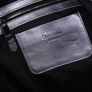 https://dbiyorq10n2b9.cloudfront.net/product-images/CBAGMOS0003/MOSCHINO-Nylon-Candy-Crush-Backpack-Multicolour-NEW-1-1.jpg.webp