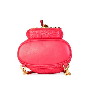 https://dbiyorq10n2b9.cloudfront.net/product-images/CBAGMOS121/Moschino-Mini-Logo-Bucket-Backpack-Bottom.jpg.webp