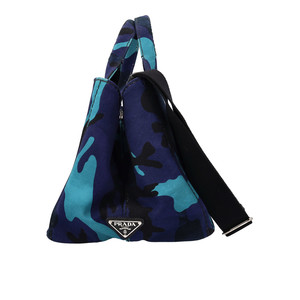 https://dbiyorq10n2b9.cloudfront.net/product-images/CBAGPRA0073/PRADA-Canapa-Camouflage-Tote-Blue_3.jpg.webp