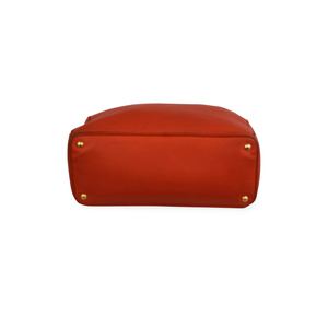 https://dbiyorq10n2b9.cloudfront.net/product-images/CBAGPRA159/PRADA-Pebbled-Leather-Tote-Orange-bottom.jpg.webp