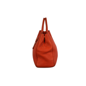 https://dbiyorq10n2b9.cloudfront.net/product-images/CBAGPRA159/PRADA-Pebbled-Leather-Tote-Orange-side-1.jpg.webp