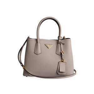 https://dbiyorq10n2b9.cloudfront.net/product-images/CBAGPRA182/PRADA-Saffiano-Cuir-Small-Double-Bag-White-NEW-front.jpg.webp