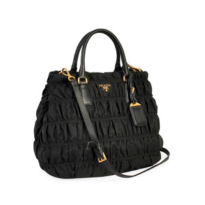 https://dbiyorq10n2b9.cloudfront.net/product-images/CBAGPRA210/PRADA-Tessuto-Gaufre-Shoulder-Bag-Black-angle.jpg.webp